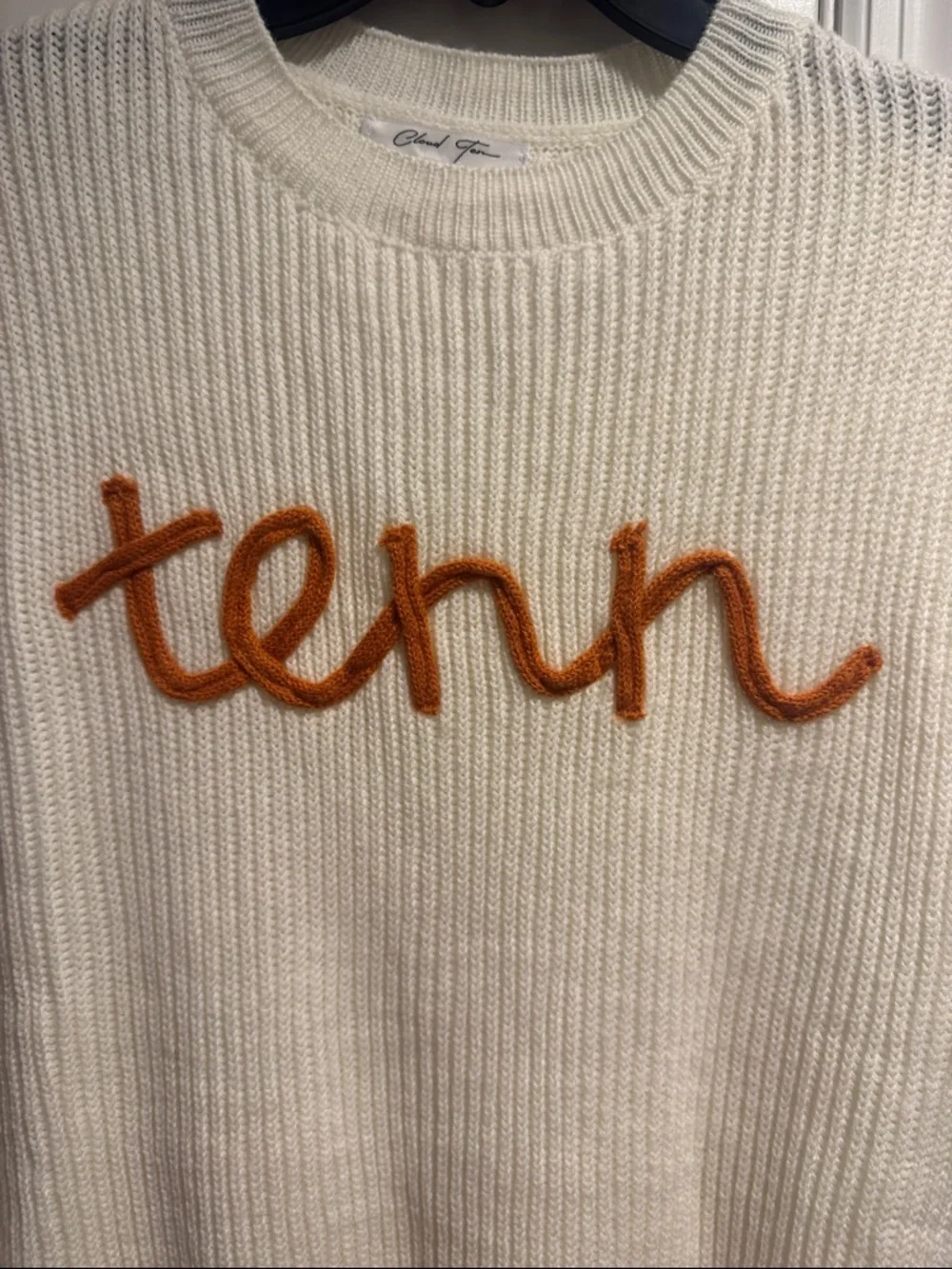 Sleeveless Crewneck Knit Sweater in Cream with Orange Script - Picture 2 of 6